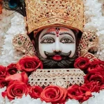 Khatushyam Ji devotee offering prayers and offerings in temple